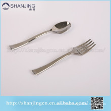 small disposable plastic fork and spoon set